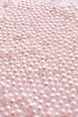 pink beads on a pink background