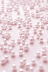 pink beads on a pink background