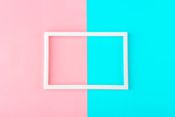 Empty white frame on a duotone background (blue, pink) with copy space for text or lettering....