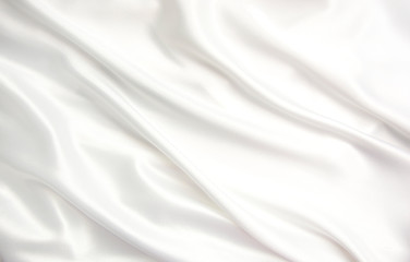Fototapeta na wymiar close up of white silk textured cloth background