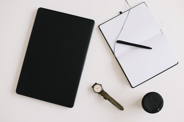 Workspace background with laptop, coffee, pen and notebook. Working, business, freelance concept. Copyspace, top view, flatlay