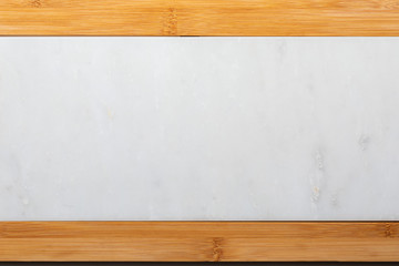 Empty table for cheeses and other openings. Copyspace (Copy space). White marble and wood. Top View.