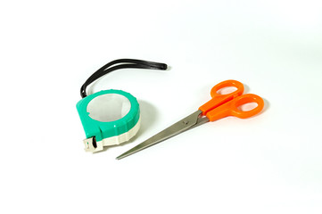 Scissor and measuring stripes individually isolated on white background