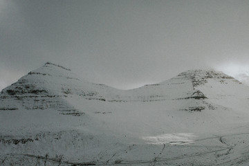 winter landscape with fog and mountains