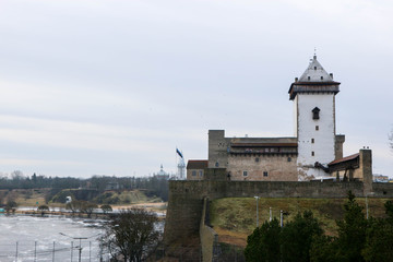 Fototapeta na wymiar View to the medieval Narva Hermann castle and the Narva river, Estonia