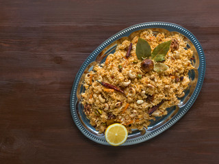 Traditional Arabic Basmati rice with vegetables. Arabic cuisine. Vegetable Biryani. Top view, copy space