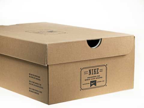 Istanbul, Turkey - February 5, 2014: Shoebox with Nike logo on it. Photo taken in a studio and isolated on white.