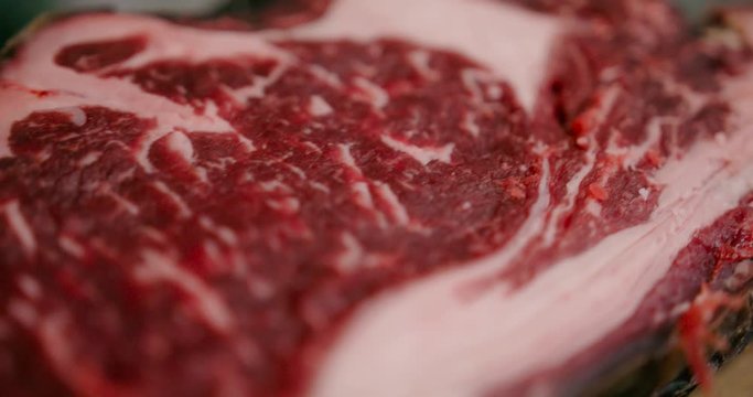 Close up view of rea juicy meat steak ready for the cook.