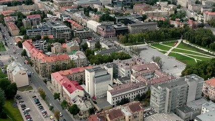VILNIUS, LITHUANIA - JULY, 2019: Aerial top view of the city roortops, Lukishku square and Gediminas avenue in Vilnius.