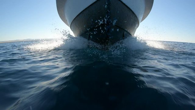 Low angle view of fishing boat sailing towards Umluj island group on Red Sea, travel and tourism in Saudi Arabia