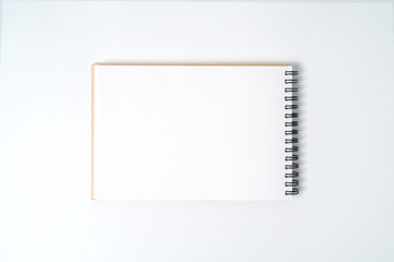 A notebook on a spring. Isolated on white background.