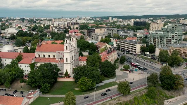 VILNIUS, LITHUANIA - JULY, 2019: Aerial view of the church of Archangel Raphael and cityscape of Vilnius at summer day.