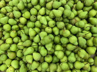 lots of ripe delicious sweet pears to eat like a background