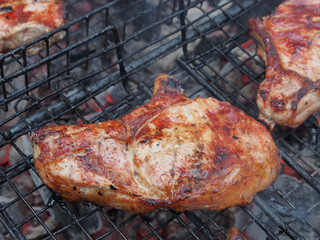 Meat, delicious fried pieces, with a Golden crust, cooked on t he grill.