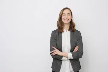 Foto op Plexiglas Confident businesswoman smiling at the camera © Martin Villadsen