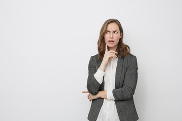 Businesswoman looking considering on what she is going to do