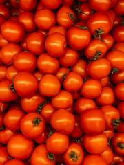 lots of ripe delicious red tomatoes for eating like a background