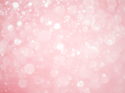 Abstract pink bokeh lights background.