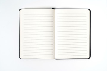 black notebook on white background with clipping path