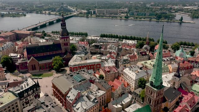 RIGA, LATVIA - MAY, 2019: Aerial top view of the famous spiers of the Riga's cathedrales in old city of Latvian capital.