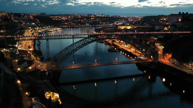 Aerial view illuminated of the Ponte de Dom Luis Bridge at night, Porto, Portugal