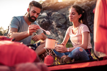 Mountaineers take break, to make tea.