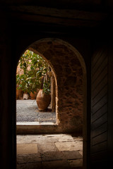 Fragments Toplu monastery courtyard in Crete, Greece.