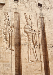 Edfu Temple wall with image of the God Horus.
