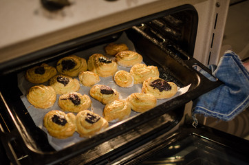baking cookies in the oven. Close up. Selective focus.