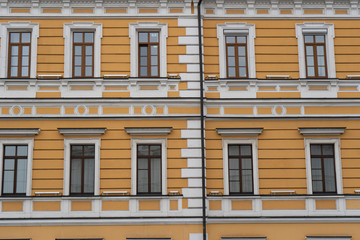 Fototapeta na wymiar An old beautiful facade of house