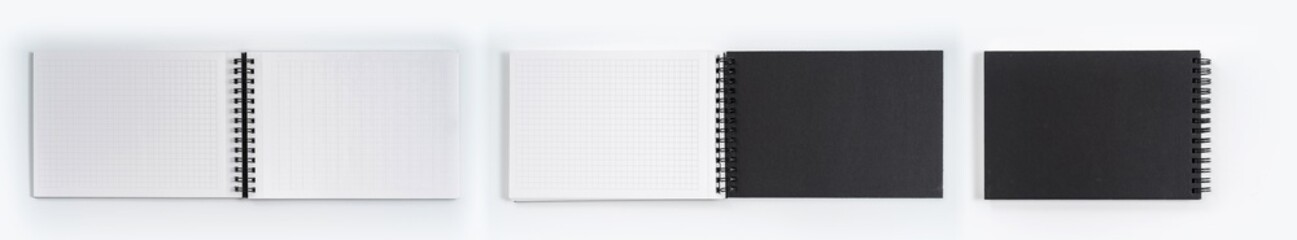 Business concept - Top view collection of black notebook on white background desk for mockup