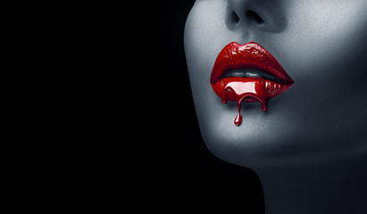 Red Lipstick dripping. Paint drips, lipgloss dripping from sexy lips, Blood liquid drops on...