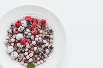 frozen berries on the white plate