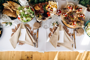 Beautiful wedding table decoration and decor in boho or rustic style