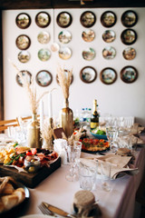 Beautiful wedding table decoration and decor in boho or rustic style