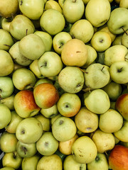 lots of ripe delicious sweet apples to eat like a background