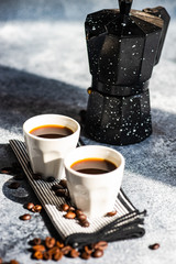 Cup of coffee on stone background