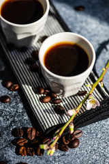 Cup of coffee on stone background