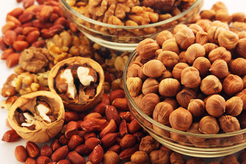 Different nuts in glass cups	