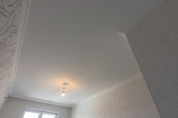 View of the leveled ceilings in the room after the renovation