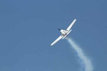 White plane in light flight