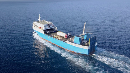 Ro Ro Ship: Aerial view of a medium RoRo Vehicle carrie vessel cruising at sea.