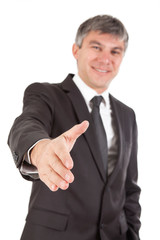 Gray haired businessman going to shake his hand