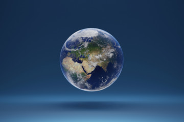 3D Planet Earth on blue studio background. Realistic globe with clouds. Europe Asia and Africa view. 3D render illustration . Elements of this image by NASA