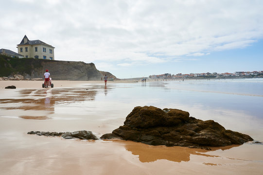 People walkin at baleal beach low tide