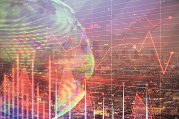 Financial graph on night city scape with tall buildings background double exposure. Analysis concept.