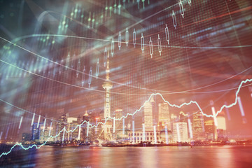 Financial graph on night city scape with tall buildings background multi exposure. Analysis concept.