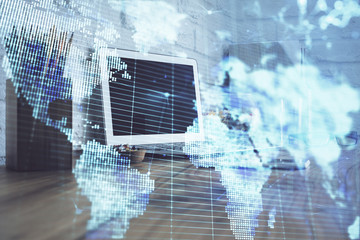 Double exposure of business theme icons and work space with computer background. Concept of success.