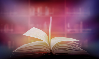 Imagine opening an old book blurred with magic power on the table and the English alphabet floating above the book with magic light as a beautiful background design.