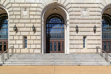 Fototapeta na wymiar Washington D.C., USA - March 1, 2020: One of the entrance of Internal Revenue Service Headquarters Building in Washington D.C., USA.